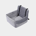Comfortable pet car seat with dual seat belts for a secure and non-slip grip.